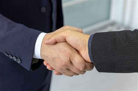 Two People Shaking Hands Photos, Download The BEST Free Two People ...