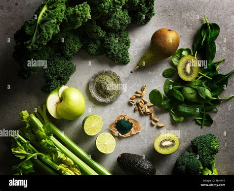 Overhead view of green colour fruit and vegetables Stock Photo - Alamy