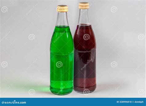 Red Non-alcoholic Carbonated Drink In The Closed Glass Bottle Stock ...
