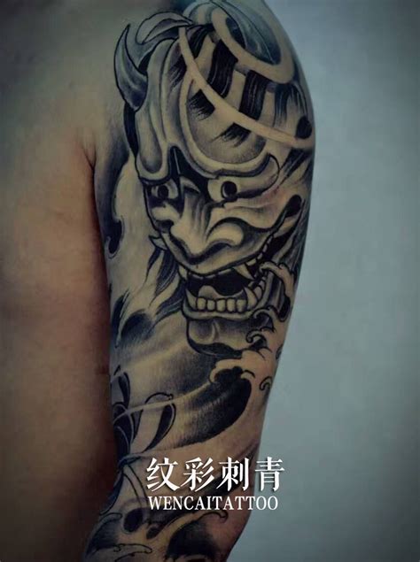 广州某车贷公司薛先生手臂上的般若浪花纹身图 - 广州纹彩刺青