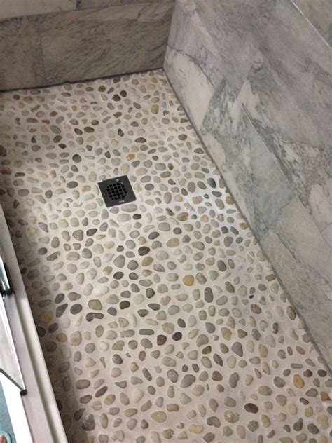 Basement guest bathroom shower floor pebbles | Pebble floor, Pebble ...