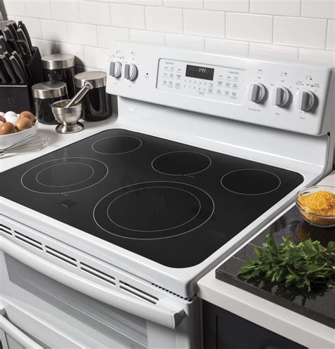 Best Buy: GE 6.6 Cu. Ft. Self-Cleaning Freestanding Double Oven Electric Convection Range White ...