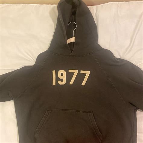 Black 1977 Essentials FEAR OF GOD hoodie Used but in... - Depop