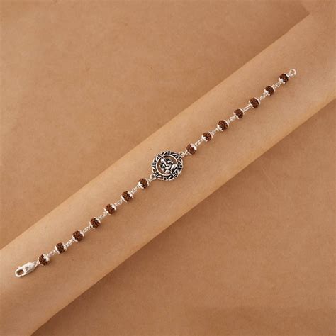 Rudraksha Silver Bracelet With Ganesh in a Circular Sphere – Prinjal Jewels