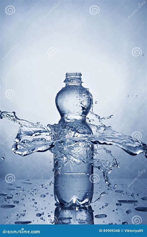 Splash in Bottle of Blue Sparkling Water Stock Photo - Image of ...