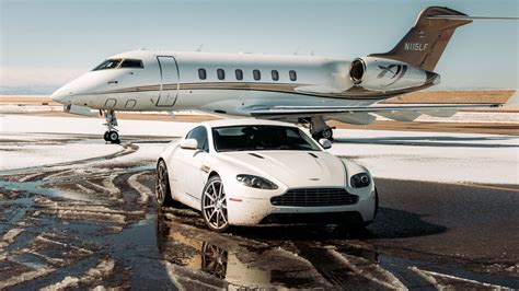 Download wallpaper 1366x768 aston martin, car, white, airplane, airport ...