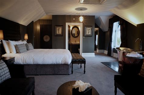 Classic dark bedroom with slanted ceilings | Moody bedrooms | Pinterest ...