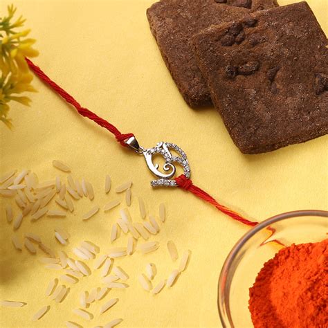 Shop Elegant Silver Ganesh Rakhi cum Pendant | Iski Uski – iskiuski.com