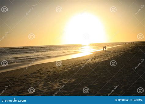 Two Old People are Walking on the Beach on a Golden Sunset on a Beach in Irvine, America Stock ...