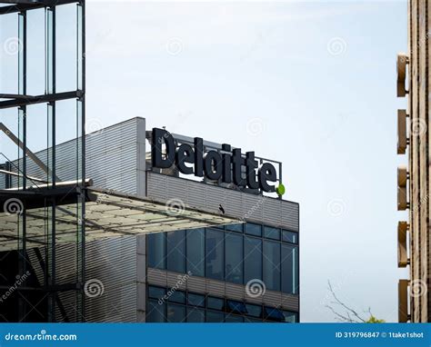 Deloitte Logo Sign on an Office Building Editorial Photography - Image ...