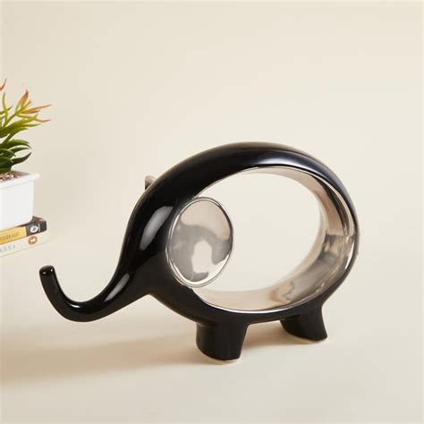 Buy Brighton Ceramic Elephant Figurine from Home Centre at just INR 2799.0