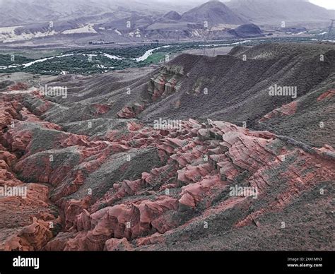 Kok-Moinok Canyon, a clay-sand structure formed on the slopes of arid ...
