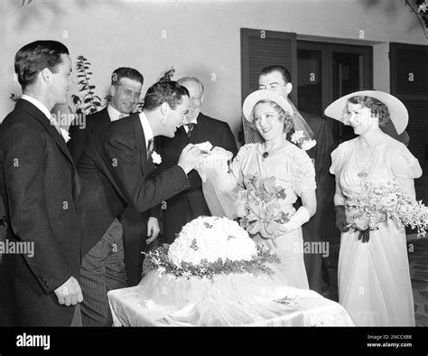 Mary Pickford handed her new husband, Charles “Buddy” Rogers, a piece ...