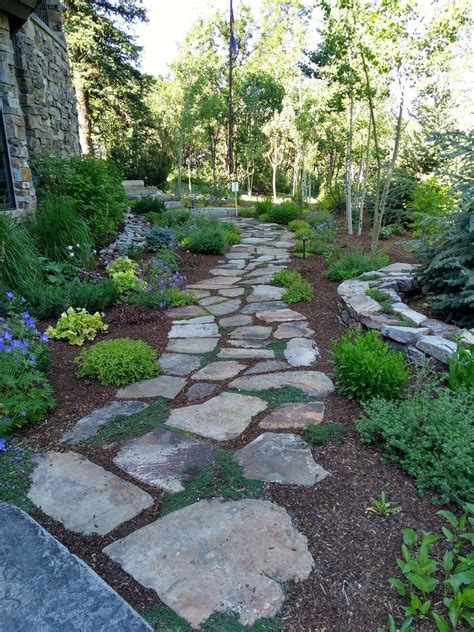 Pin by Lauren Barratt on Backyard Design Ideas in 2025 | Stone garden ...
