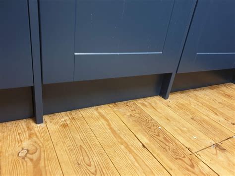 Laminate under kitchen units | DIYnot Forums