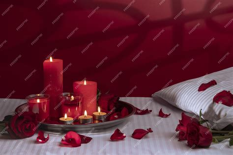 Rose Petals On Bed With Candles