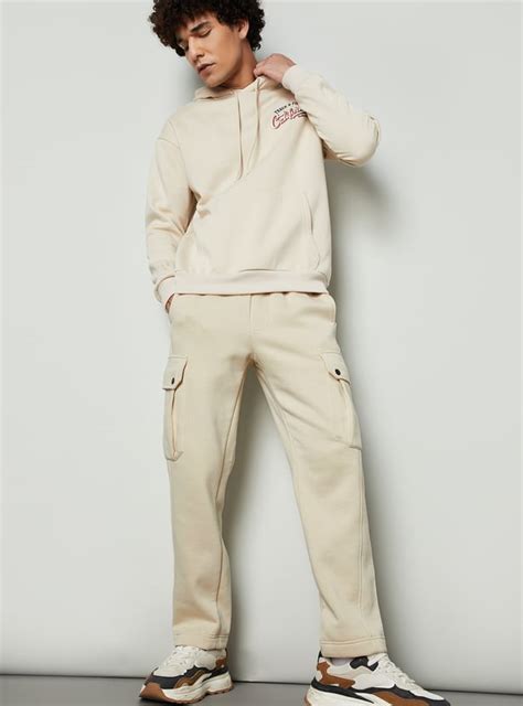 Buy Men Relaxed Fit Solid Cargos Online at just Rs. 1599.0 ...