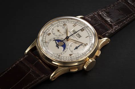 Reference 1518, A pink gold perpetual calendar chronograph wristwatch ...