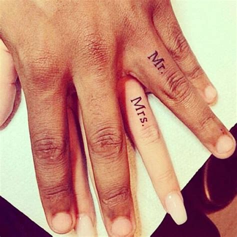 finger tattoos matching