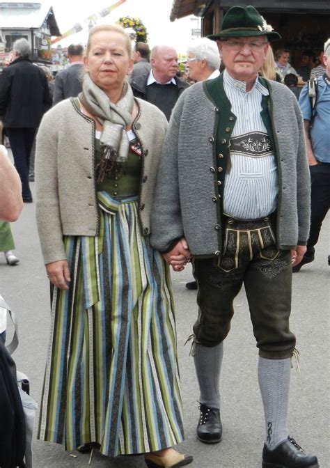 Couple dressed in Bavarian Tracht during Oktoberfest in Munich ...
