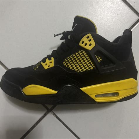 Jordan 4 Retro Yellow Thunders (used) some... | Depop