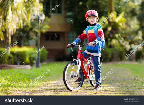 Kid Riding Bicycle To School