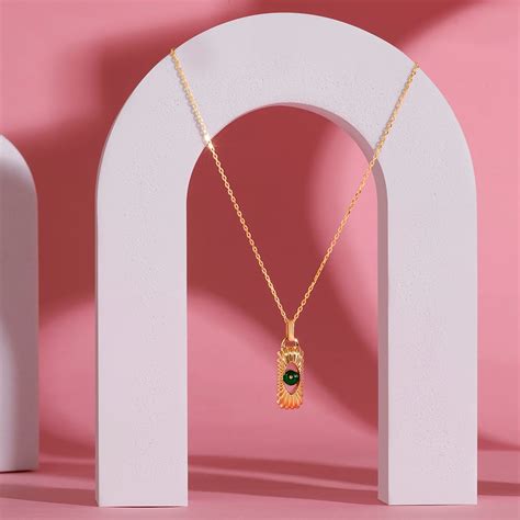 Elegant Enchantment 18KT Chain Emerald Pendant with chain