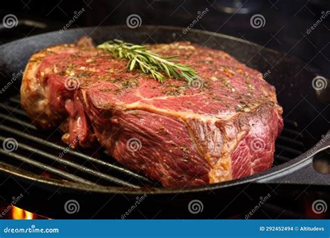 Searing Ribeye Steak in a Cast-iron Skillet Stock Photo - Image of ...