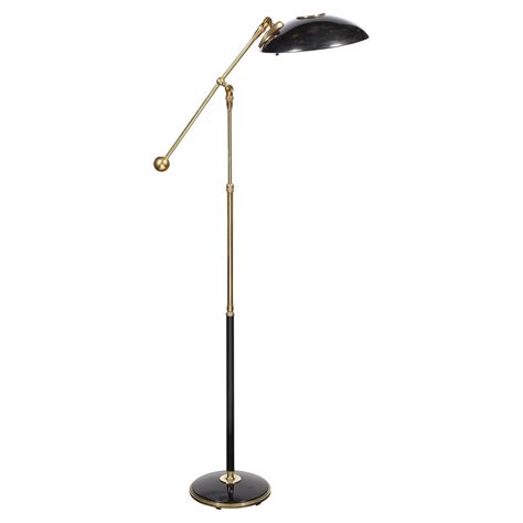 Sleek mid century brass pole floor lamp at 1stDibs