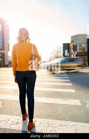 USA Maryland Bethesda Pedestrian safety woman crossing in a crosswalk ...