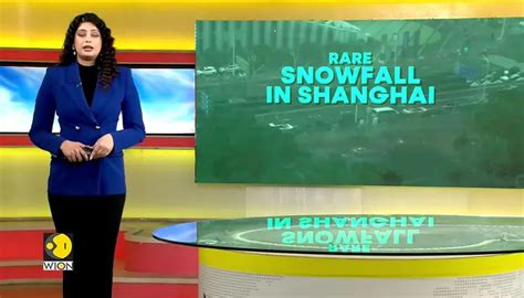 Rare Snowfall Blankets Shanghai As Southern China Shivers In Cold Snap
