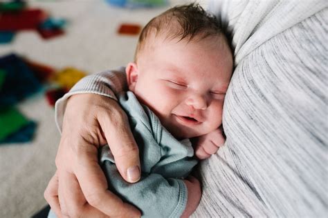 Newborn Baby Smiling In Sleep
