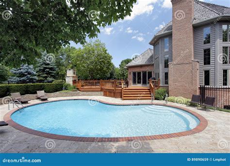 Swimming Pool with Wood Deck Stock Image - Image of house, residence ...