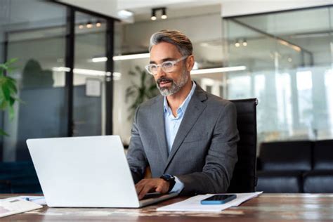 Business Man Using Computer Image 的图像结果