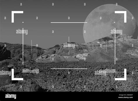 A giant of a moon appears before a giant of a planet undergoing seasonal changes in this natural col