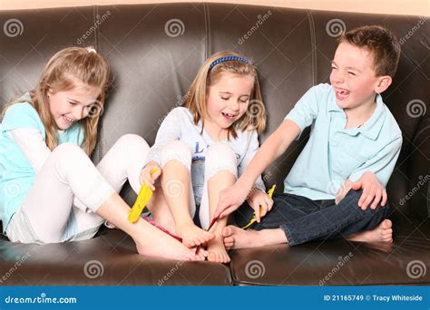 Children Tickling Feet with Feather Stock Image - Image of female, love ...