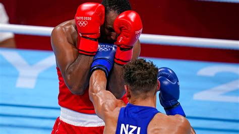 Olympic boxer Youness Baalla bites opponent David Nyika in a moment ...