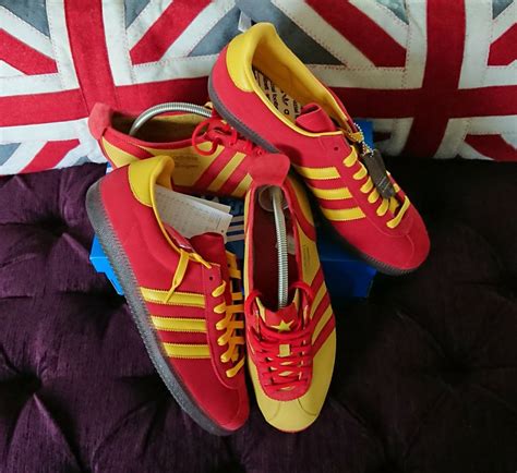 Stylish adidas Spiritus Sneakers in Red and Yellow