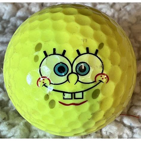 This Wilson SPONGEBOB SQUAREPANTS Golf Ball is a... - Depop