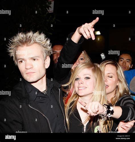 Avril Lavigne and husband Deryck Whibley leaving Bar Deluxe Los Angeles ...