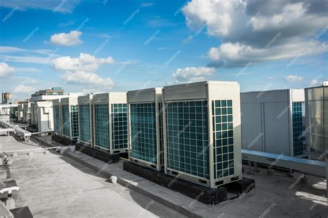 Premium Photo | Central air conditioners condenser units at building ...