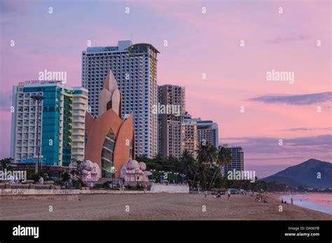 Photograph of Nha Trang beach with many high rise buildings behind it