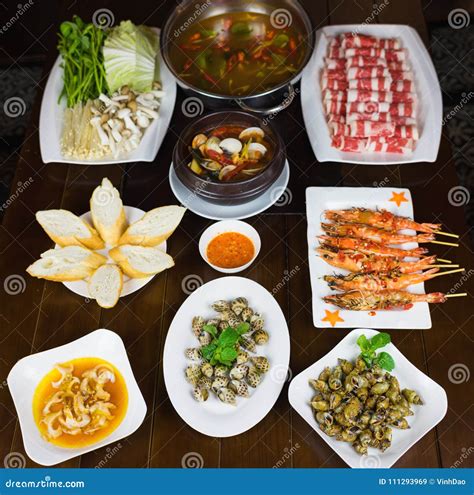 Set of Vietnamese Seafood with Barbecue Tiger Shrimps, Grilled Sweet ...