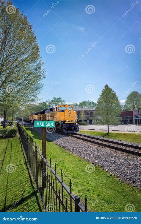 Historic Downtown Madison with a Classic Train Against a Bright Blue Sky in United States ...
