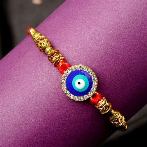 Buy Online Crystal Boundaries Round Evil Eye Ethnic Rakhi -Urmika – Ferosh