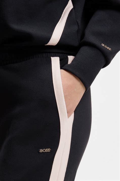 BOSS - Tapered-fit tracksuit bottoms with contrast inserts - Black