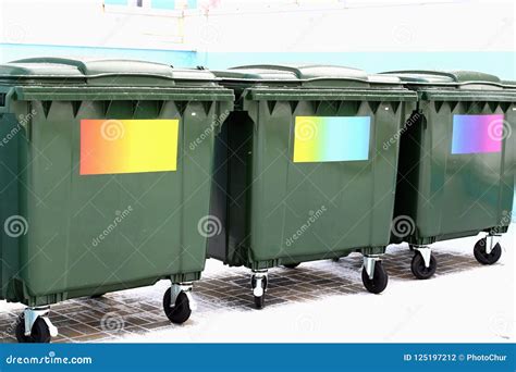 Green Garbage Cans without Labels with Colored Stickers Stock Photo ...