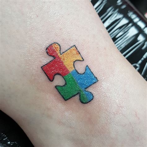 Autism Puzzle Piece Tattoo
