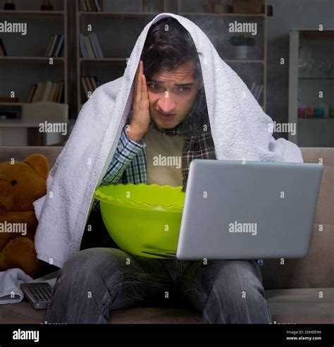 Sick man doing inhalation at night in home Stock Photo - Alamy