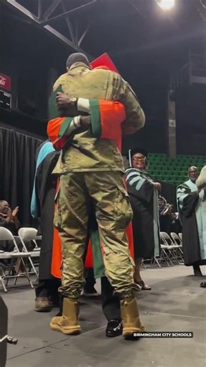 Huffman High School graduate reunited with deployed father at graduation